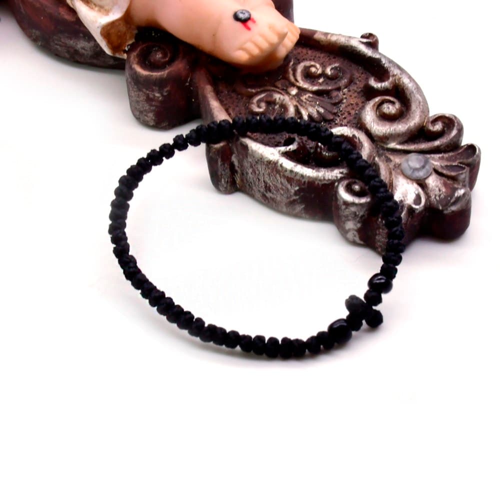 Black Adjustable Cross Bracelet with hand-braided knotted design and cross detail