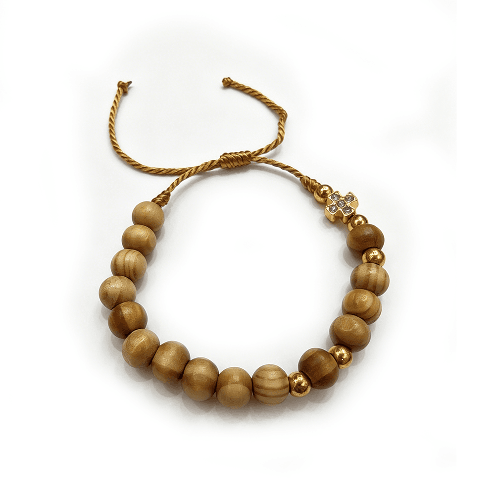 Adjustable Cross Bead Bracelet with decorative beads and woven drawstring closure