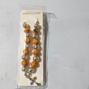 Elastic Cross Bead Bracelet with angular bead details and cross accent