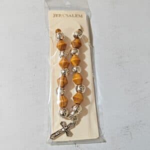 Cross Bead Stretch Bracelet with a beaded design and cross accent