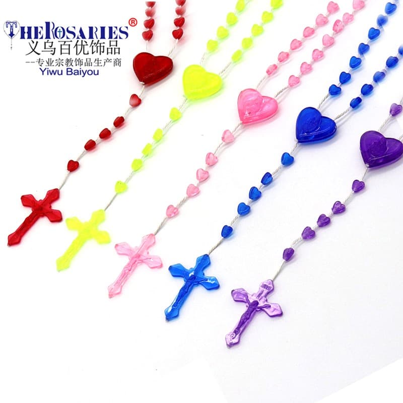 Glow Heart Rosary Necklace with luminous heart-shaped beads and cross detail