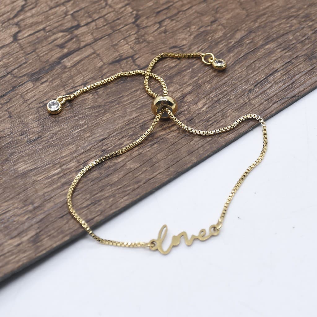 Gold Heart LOVE Bracelet featuring a golden heart and LOVE detail